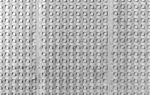 Gray concrete wall, square pattern, texture Stock Photos