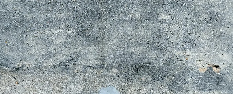 Gray concrete wall texture with rough surface, weathered background for design. Stock Photos