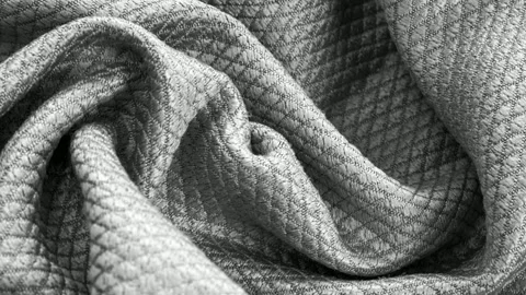 Gray cotton fabric with an interesting pattern Stock Footage 312698959