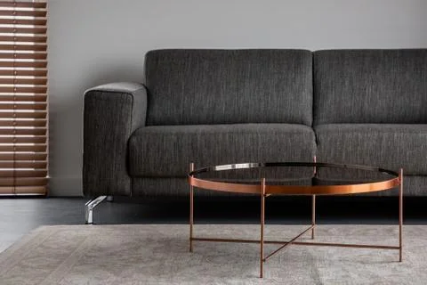 Gray couch and coffee table Stock-Fotos