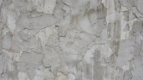 Gray cracked wall texture background. Fotos Stock