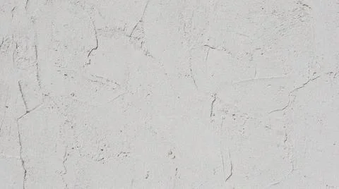 Gray cracked wall texture background. Фото