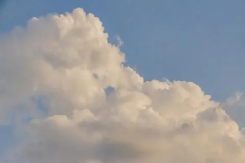 Gray Cumulus clouds in a blue sky Stock Photos