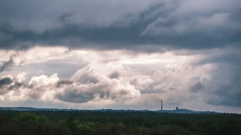 Gray Cumulus Clouds Moves over the Horizon and an Industrial Plant, Timelapse Stock Footage 155278168