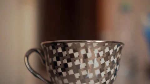 https://images.pond5.com/gray-cup-table-pour-boiling-footage-112630048_iconl.jpeg