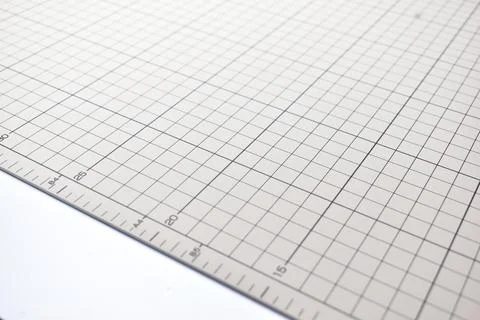 Gray cutting mat board background with line and scale measure guide pattern f Stock Photos