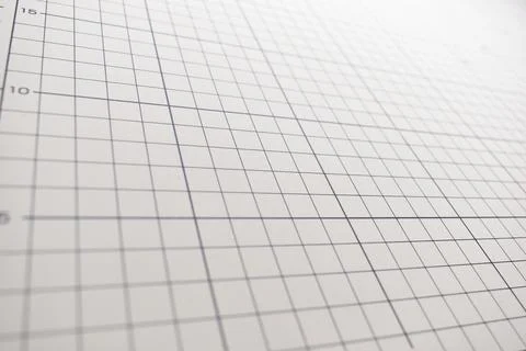 Gray cutting mat board background with line and scale measure guide pattern f Stock Photos