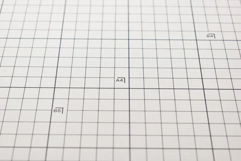 Gray cutting mat board background with line and scale measure guide pattern f Stock Photos