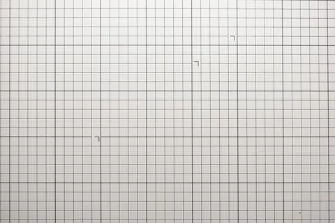 Gray cutting mat board background with line and scale measure guide pattern.. Stock Photos