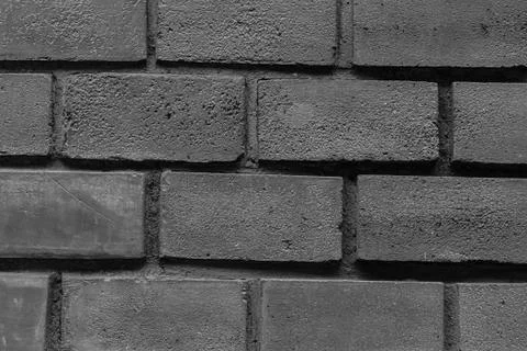 Gray dark stone canvas horizontal row of folded rectangular blocks dark base 스톡 사진