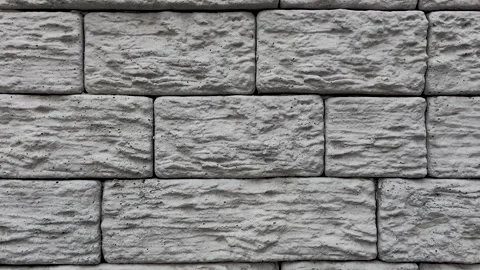 Gray decorative brick effect tiles on the facade of the house Stock Footage 249208626