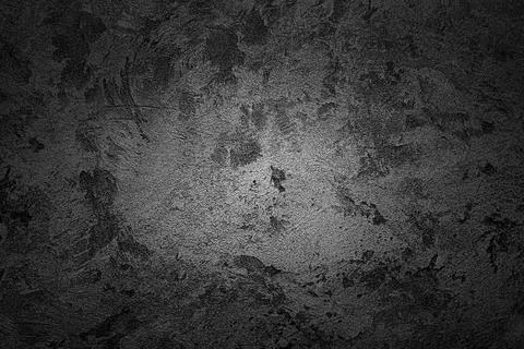 Gray decorative plaster grunge background with vignette. Stock Photos