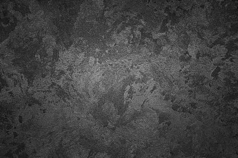 Gray decorative plaster grunge background with vignette. Stock Photos