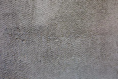 Gray decorative plaster Stock Photos