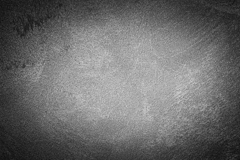 Gray decorative plaster texture with vignette. Abstract grunge background w.. Stock Photos