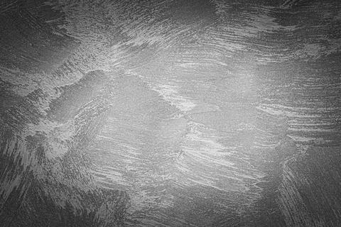 Gray decorative plaster texture with vignette. Abstract grunge background w.. Stock Photos