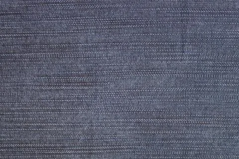 Gray denim background. Stock Photos