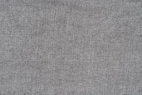Gray denim fabric texture background with diagonal weave pattern 写真素材