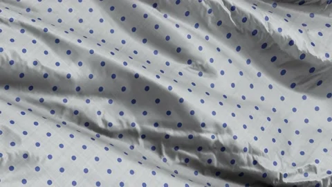 Gray dotty pattern textile fabric waving on the wind background. Dotted canva Stock Footage 197307872