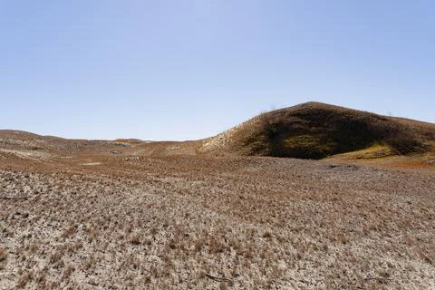 The Gray Dunes, or the Dead Dunes is sandy hills with a bit of green specks.. Stock Photos