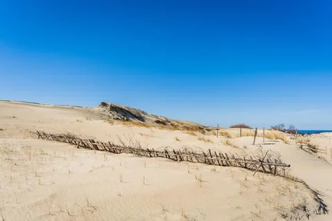 The Gray Dunes, or the Dead Dunes is sandy hills with a bit of green specks.. Stock Photos