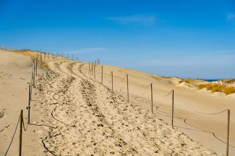 The Gray Dunes, or the Dead Dunes is sandy hills with a bit of green specks.. Stock Photos