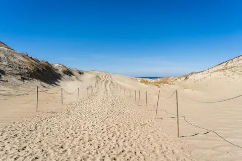 The Gray Dunes, or the Dead Dunes is sandy hills with a bit of green specks a Stock Photos
