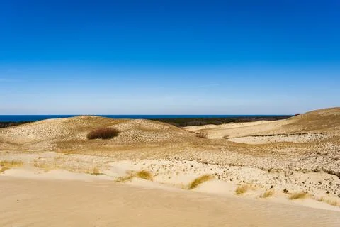 The Gray Dunes, or the Dead Dunes is sandy hills with a bit of green specks a Stock Photos