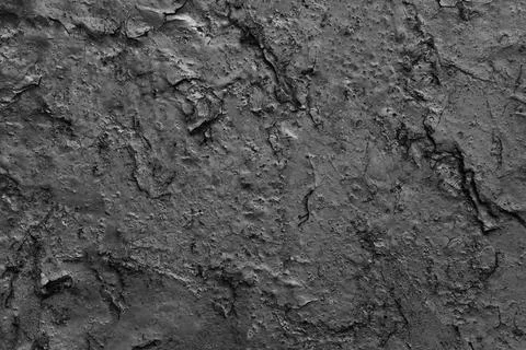 Gray embossed background with cracks Photos
