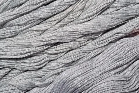 Gray embroidery floss as background texture Stock Photos