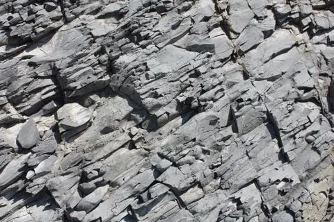 Gray erosed rock Stock Photos