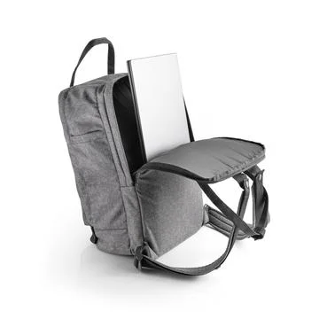 Gray fabric backpack with a laptop in the back compartment. Casual backpack. Stock Photos