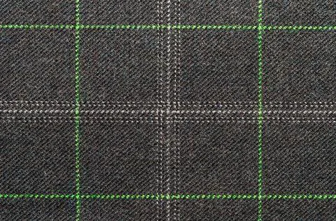 Gray fabric with green plaid pattern filling frame. Versatile textile backgro Stockfoto's