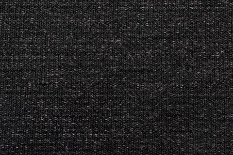 Gray fabric. Material for tailoring. Pattern with straight small dark lines Stock Photos