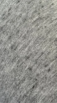 Gray fabric texture with subtle thread pattern ideal for use as a textile b.. Foto stock