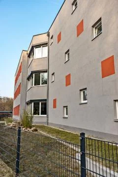Gray facade with red accents Foto stock