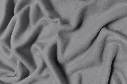 Gray fleece crumpled or wavy fabric texture background. Abstract linen cloth Stock Photos