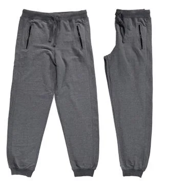 Gray folded jogging pants. Stock Photos