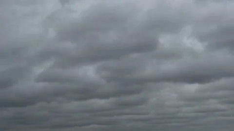 Gray Gloomy Sky Covered With Gray Rain Clouds in Bad Weather, Time Lapse. Backgr Stock Footage 162378336