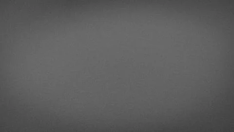 Gray grainy texture background with abstract black and dark gray shades 4K .. Stock Photos