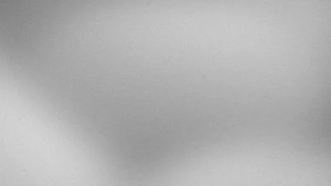 Gray grainy texture background with smooth gradient blur suitable for tech .. Stock Photos