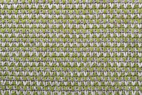 Gray green knitting wool texture background. Canvas is crocheted of natural Stock Photos