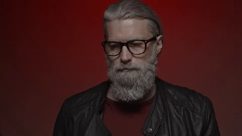 Gray haired man in glasses Stock Footage 124792274