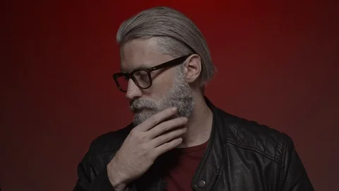 Gray haired man in glasses Stock Footage 124792447