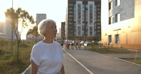 Gray-haired man hugs his elderly wife Stock-Footage 135555947