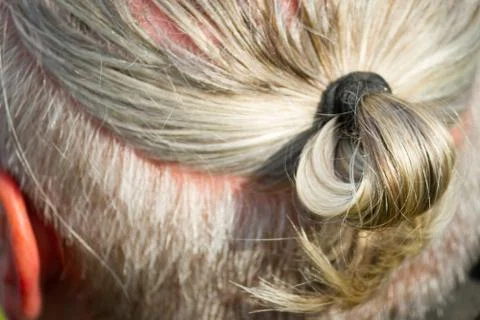 Gray-haired man with a tail Stock Photos