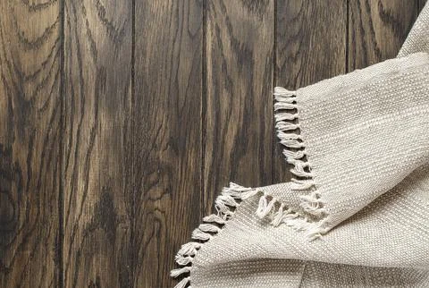 Gray handmade tablecloth from right corner of oak table 스톡 사진