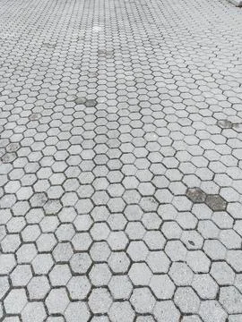 Gray hexagonal paving pattern textured background vertical Stock Photos
