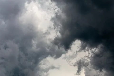 Gray incoming storm clouds dark closeup backdrop 库存照片