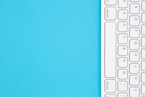 Gray keyboard on a blue background Foto stock